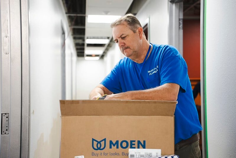 Picture of Moen box with plumber