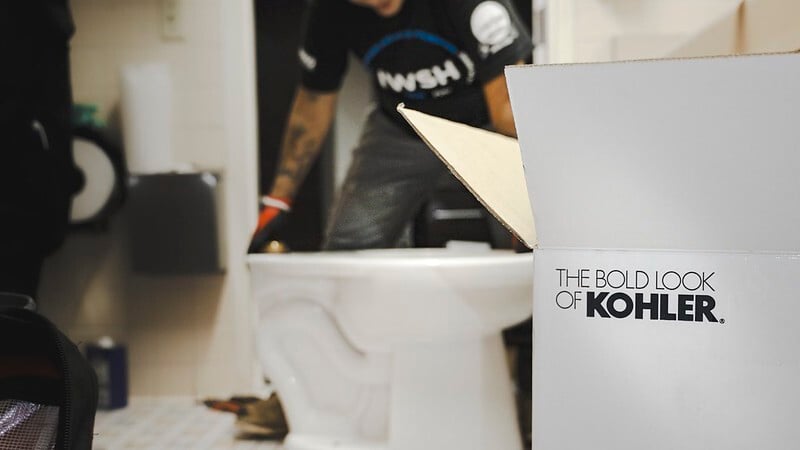 Picture of Kohler box in front of plumber