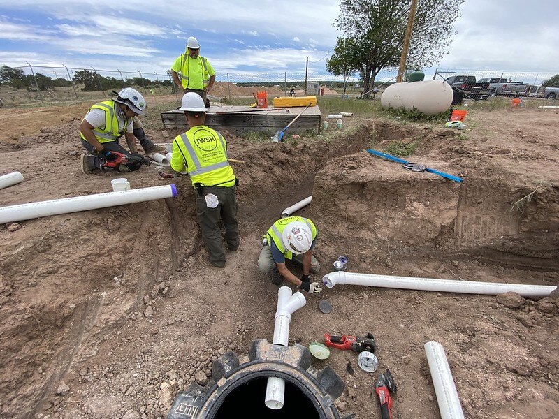 Plumbers Installing Pipes for Navajo Nation