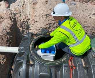 IWSH volunteer installs septic tanks for the Navajo Nation